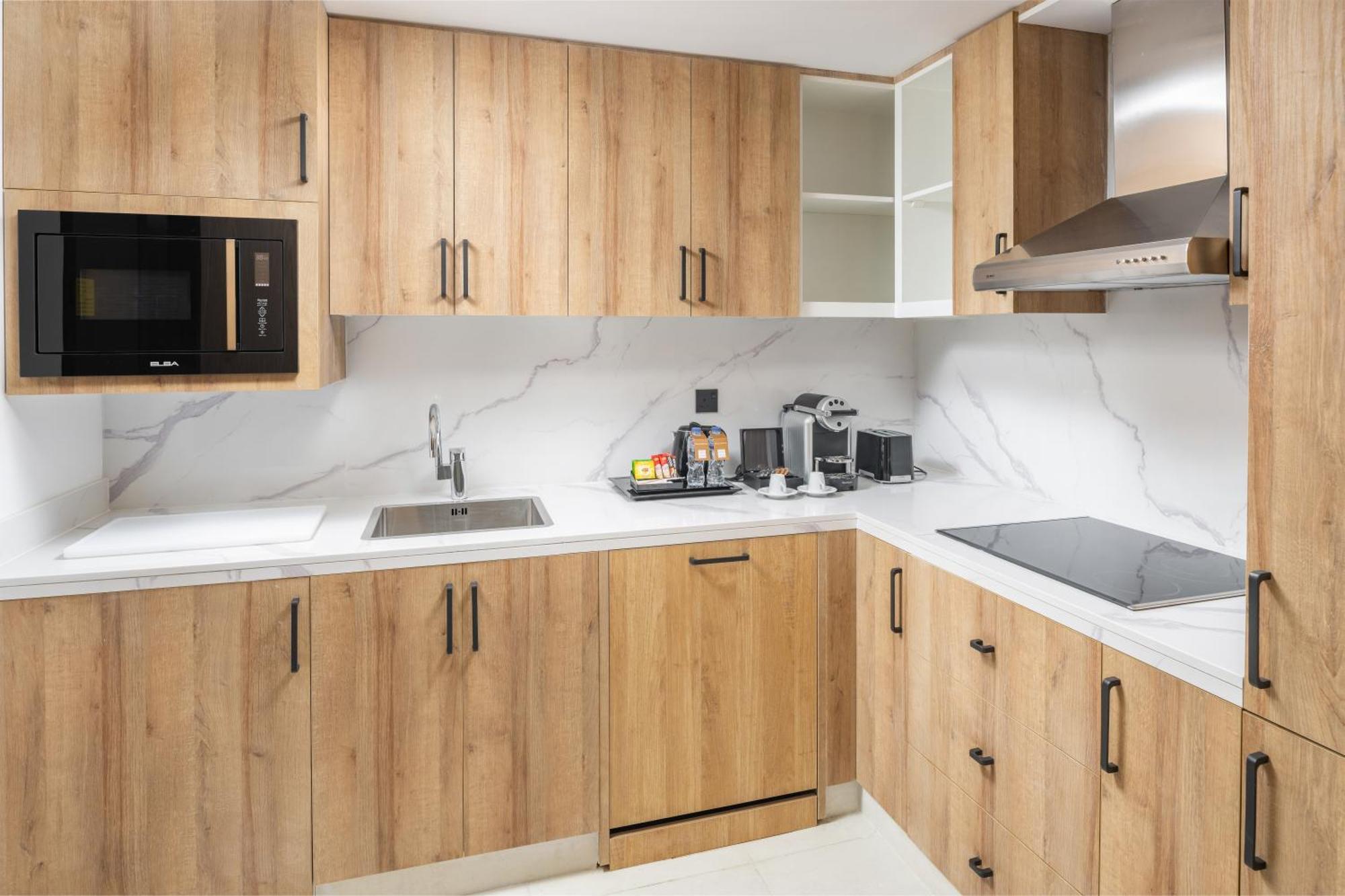 Taiba Suites Madinah Medina Ngoại thất bức ảnh A modern kitchen
